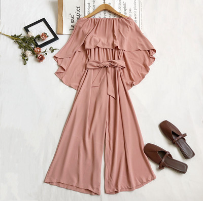 Sieviešu kombinezons ar jostu platu modeli