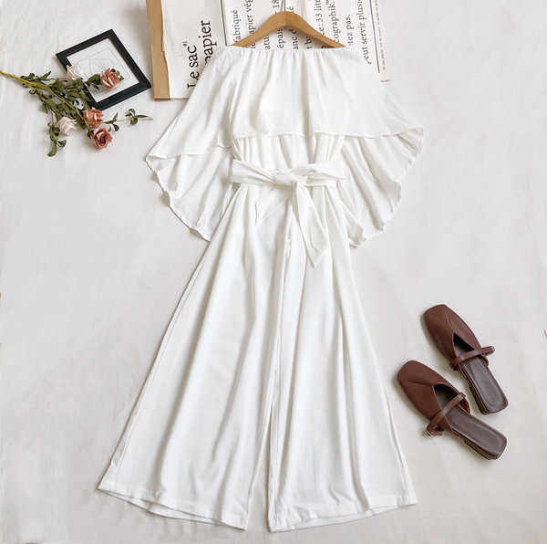 Sieviešu kombinezons ar jostu platu modeli