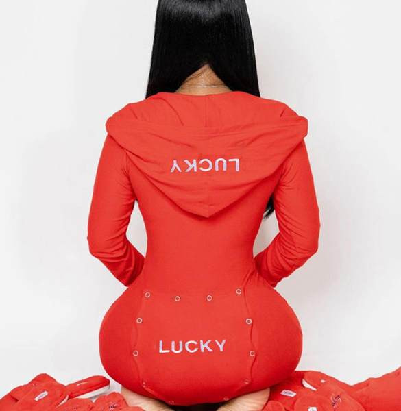 Naiste pikkade nööpidega liibuv kombinesoon