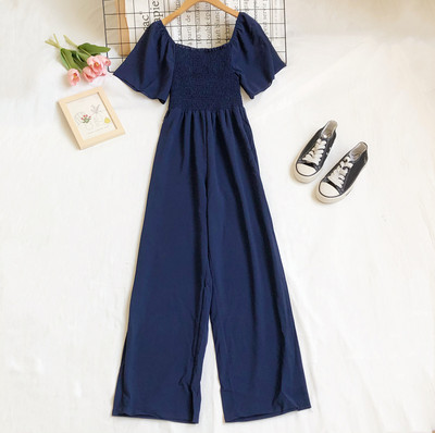 Plats sieviešu kombinezons ar īsām piedurknēm