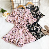 Moderns sieviešu kombinezons ar špica kakla izgriezumu un ziedu motīviem