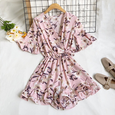 Moderns sieviešu kombinezons ar špica kakla izgriezumu un ziedu motīviem