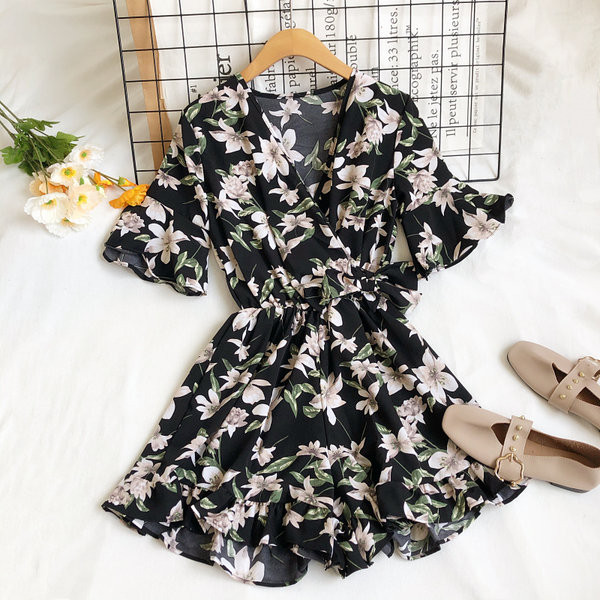 Moderns sieviešu kombinezons ar špica kakla izgriezumu un ziedu motīviem