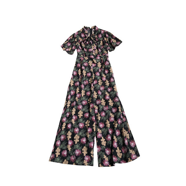 Garš sieviešu kombinezons ar ziedu motīviem un rāvējslēdzēju