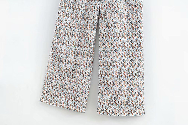 Hosszú overall színes mintával és fürtökkel