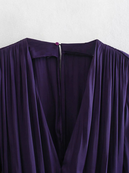 Elegants sieviešu kombinezons ar jostu