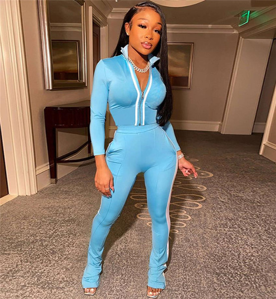 Moderns komplekts no divām daļām - īss džemperis un bikses ar apmalīti