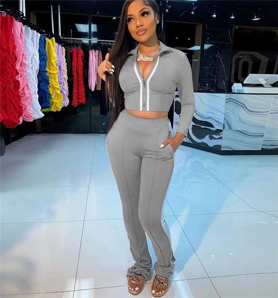 Moderns komplekts no divām daļām - īss džemperis un bikses ar apmalīti