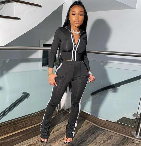 Moderns komplekts no divām daļām - īss džemperis un bikses ar apmalīti