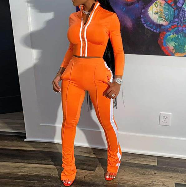 Moderns komplekts no divām daļām - īss džemperis un bikses ar apmalīti