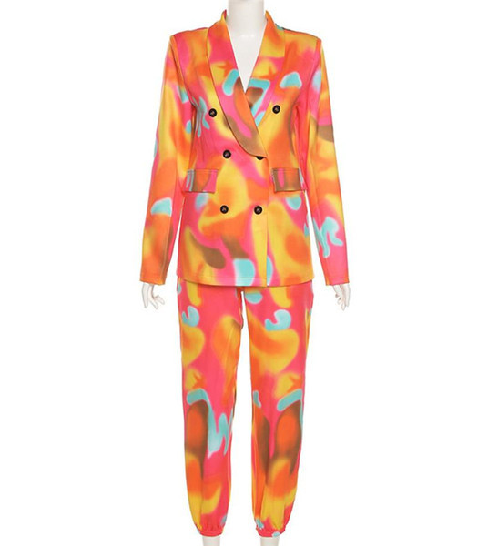 Modernus moteriškas komplektas - spalvingo rašto švarkas ir kelnės