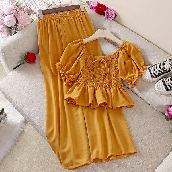 Jauna modeļa sieviešu blūzes komplekts ar apaļu kakla izgriezumu un garām biksēm