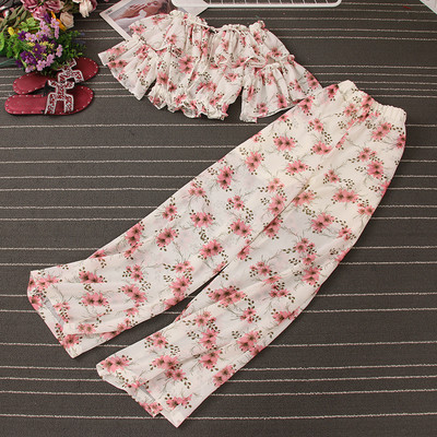 Naiste lillemotiividega kaheosaline komplekt