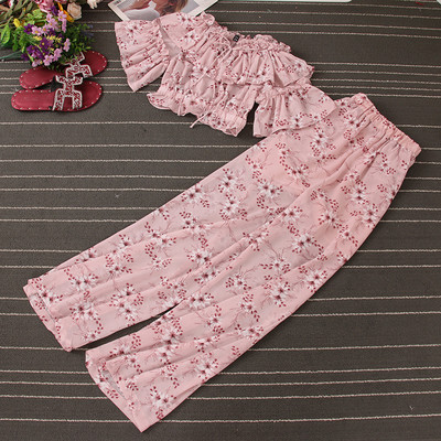 Naiste lillemotiividega kaheosaline komplekt