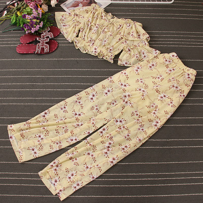 Naiste lillemotiividega kaheosaline komplekt