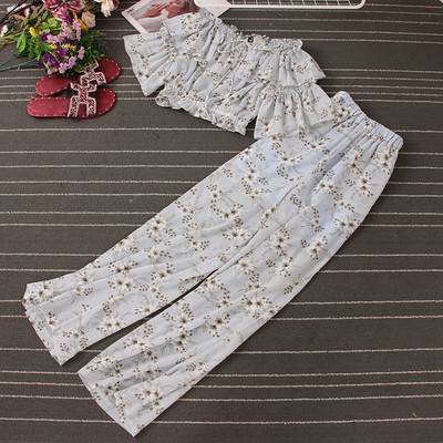 Naiste lillemotiividega kaheosaline komplekt