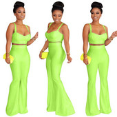 Naiste komplekt õhukeste rihmadega kaheosalisest topist ja laiad kõrge vöökohaga püksid