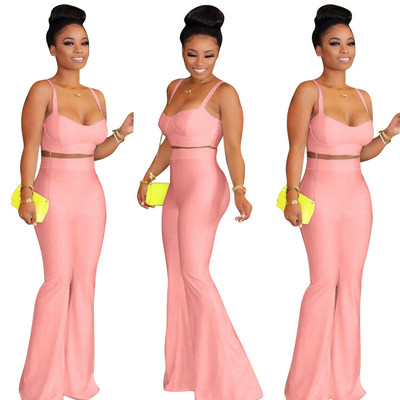 Naiste komplekt õhukeste rihmadega kaheosalisest topist ja laiad kõrge vöökohaga püksid