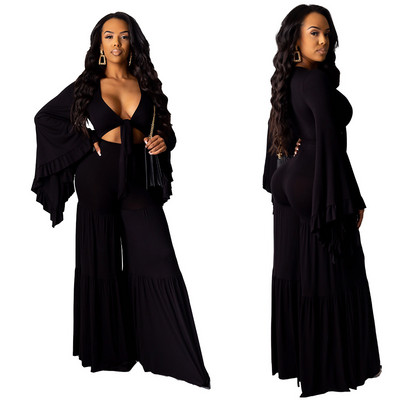 Uue mudeli naiste komplekt, millel on lühike pikkade varrukatega topp ja laiad kõrge vöökohaga püksid