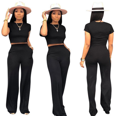 Naiste komplekt kaheosalisest lühikeste varrukatega topist ja taskutega pükstest