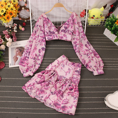 Naiste kaheosaline komplekt - lillemotiividega seelik ja pluus