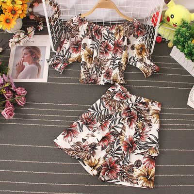 Kaasaegne kaheosaliste lillemotiividega komplekt