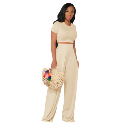 Naiste komplekt kaheosaline lühikeste varrukatega T-särk ja laiad püksid