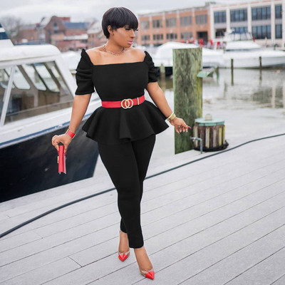 Naiste komplekt kaheosalisest kandilise kaelusega pluusi ja liibuvate pükstega