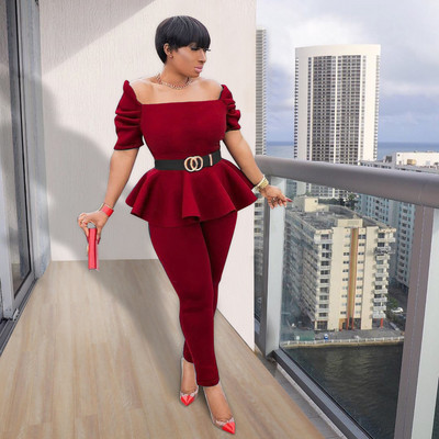 Naiste komplekt kaheosalisest kandilise kaelusega pluusi ja liibuvate pükstega