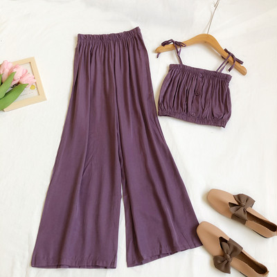 Sieviešu komplekts no divām daļām platām biksēm un topiņa ar plānām lencēm