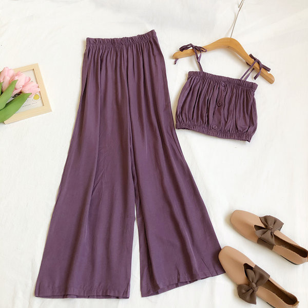 Sieviešu komplekts no divām daļām platām biksēm un topiņa ar plānām lencēm