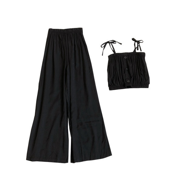 Sieviešu komplekts no divām daļām platām biksēm un topiņa ar plānām lencēm