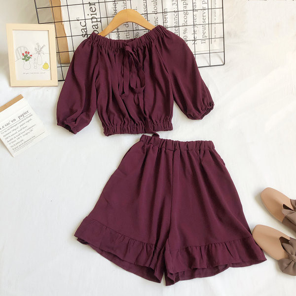 Uue mudeli naiste komplekt lühikese pluusi ja kõrge vöökohaga pükstega