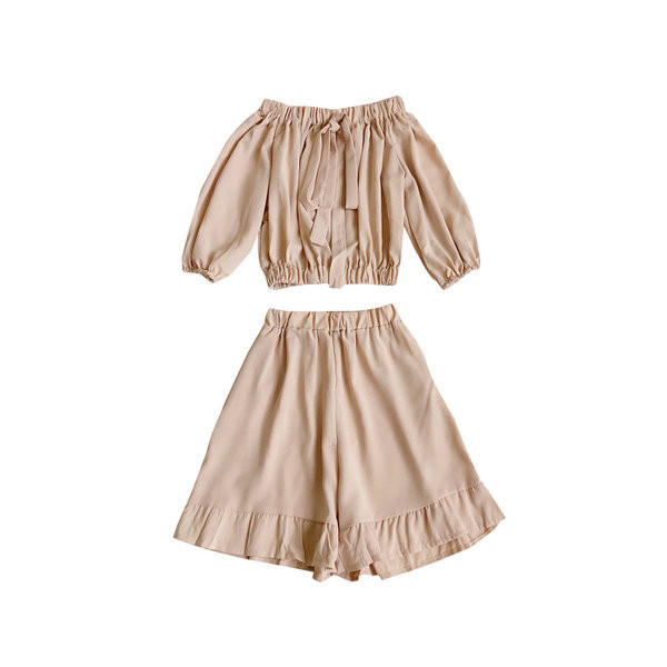 Uue mudeli naiste komplekt lühikese pluusi ja kõrge vöökohaga pükstega