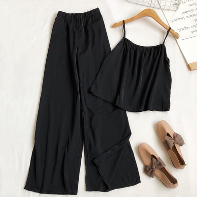 Sieviešu komplekts no divām daļām bikses un platām biksēm ar šķēlumiem kājās