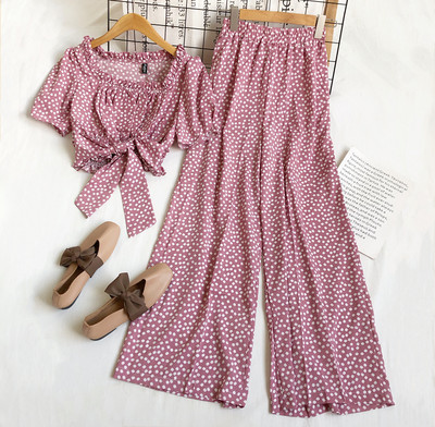 Jauna modeļa komplekts no divām daļām ar ziedu motīviem sievietēm