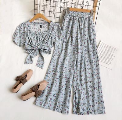 Jauna modeļa komplekts no divām daļām ar ziedu motīviem sievietēm