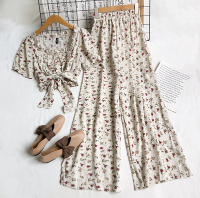 Jauna modeļa komplekts no divām daļām ar ziedu motīviem sievietēm