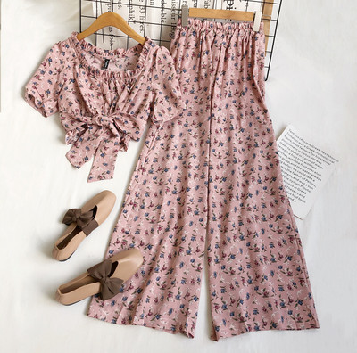 Jauna modeļa komplekts no divām daļām ar ziedu motīviem sievietēm