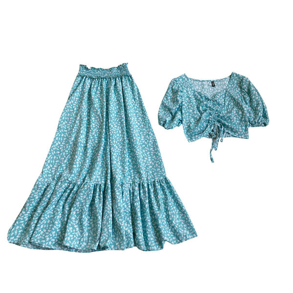 Sieviešu divdaļīgu svārku komplekts ar augstu vidukli un īsu topiņu ar saitēm