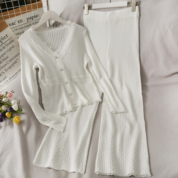 Sieviešu komplekts no divām daļām - bikses un veste