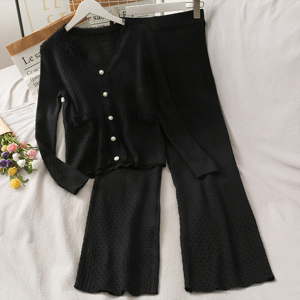 Sieviešu komplekts no divām daļām - bikses un veste