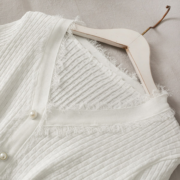 Sieviešu komplekts no divām daļām - bikses un veste