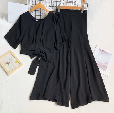 Naiste komplekt lühikese ovaalsete dekolteesidemetega pluusi ja laiade pükstega