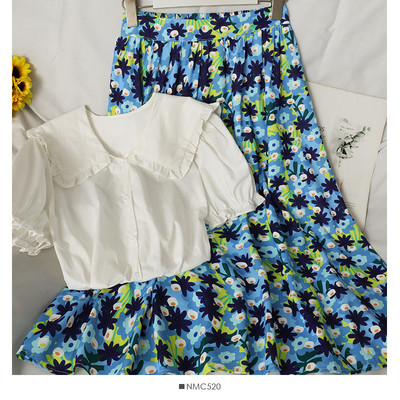 Moodne kaheosaline lillemotiivide ja nööpidega naiste komplekt