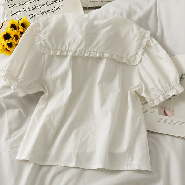 Moodne kaheosaline lillemotiivide ja nööpidega naiste komplekt