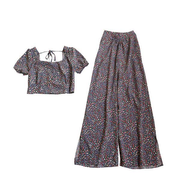 Naiste komplekt lühikese pluusi ja lillemotiividega pükstega