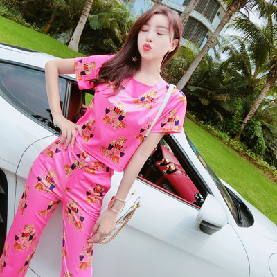 Moodne suvine komplekt - värvitrükiga pluus ja pikad püksid