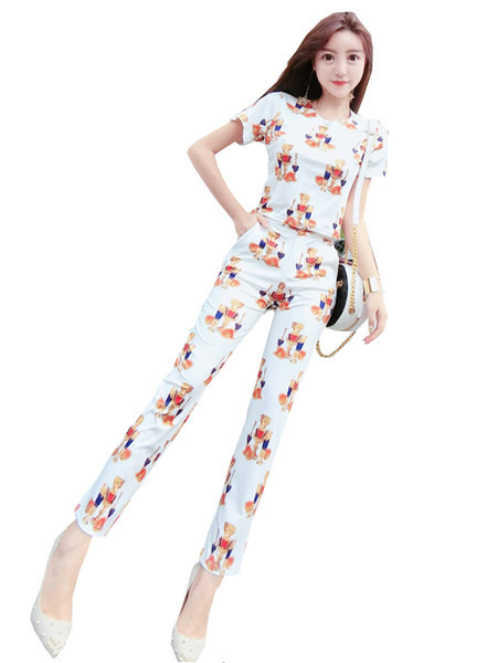 Moodne suvine komplekt - värvitrükiga pluus ja pikad püksid