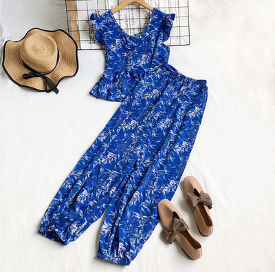 Naiste komplektne pluus V-kaelusega ja kõrge vöökohaga püksid